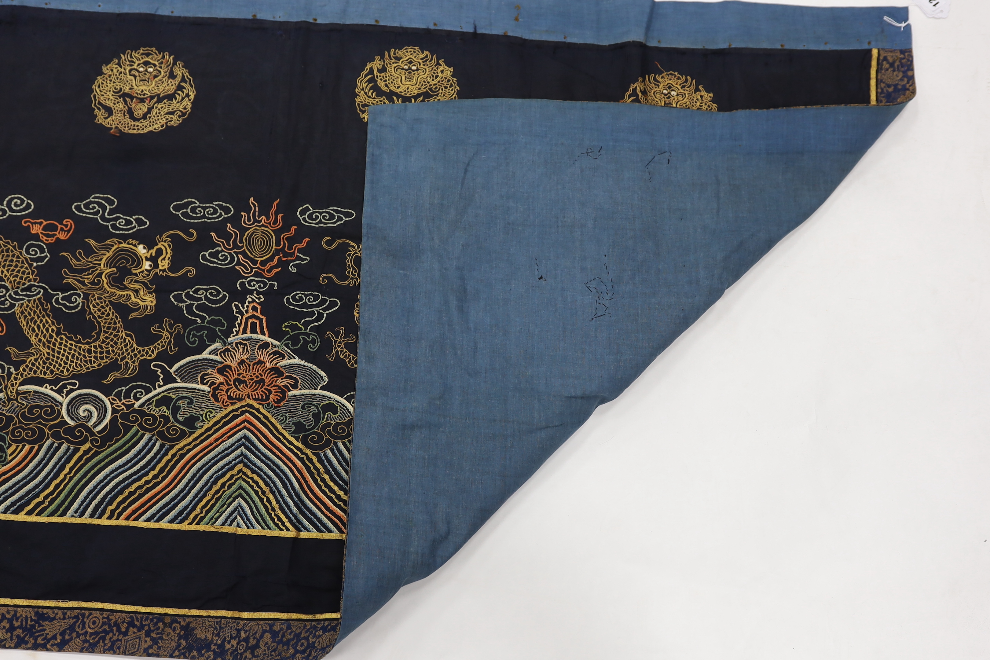 A Chinese long gauze gold dragon and multi-coloured embroidered altar cloth, with brocade borders, 290cm long x 78cm high